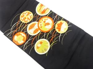丸に蝶・草花模様織り出し　名古屋帯